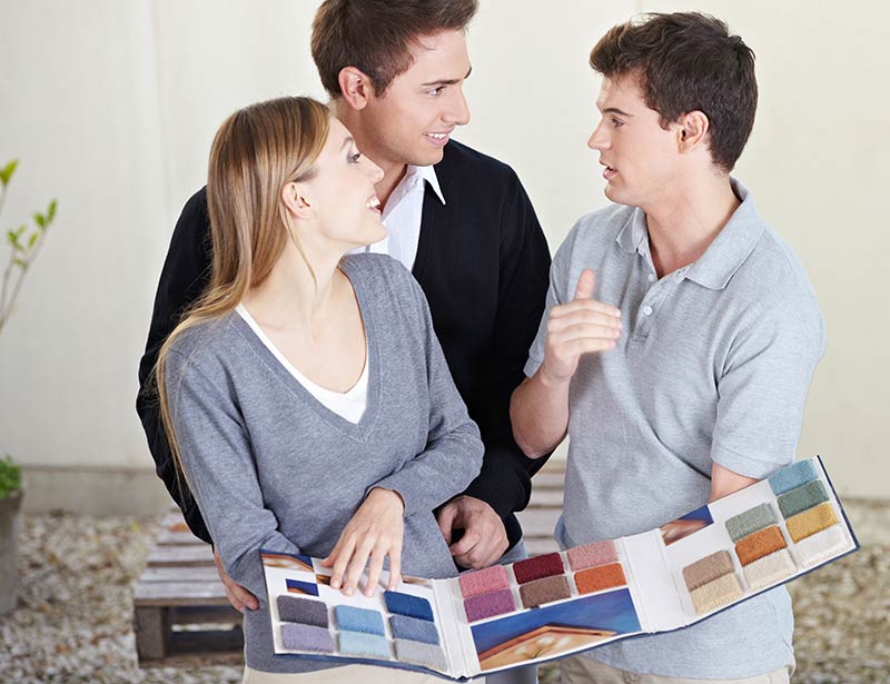 Couple Looking at Carpet Samples